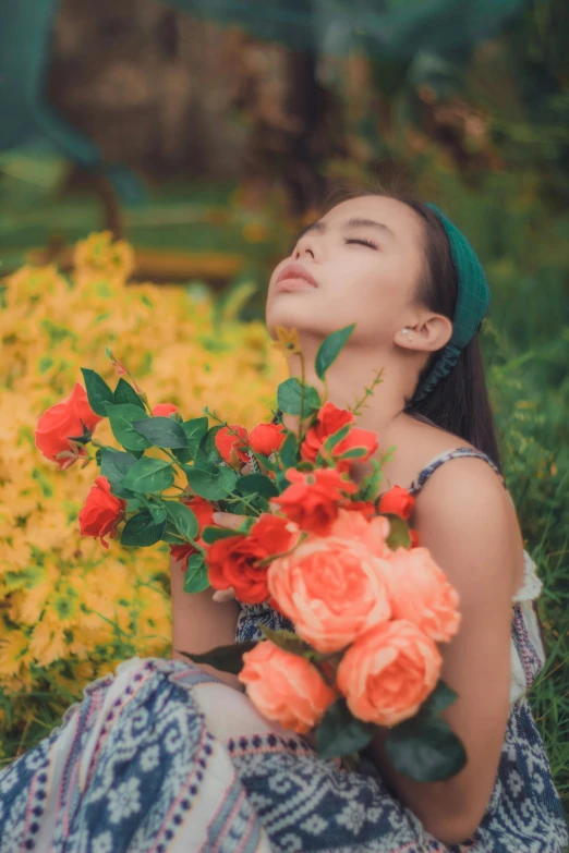 a woman sitting in the grass holding a bunch of flowers, pexels contest winner, asian girl, avatar image, laying on roses, profile image