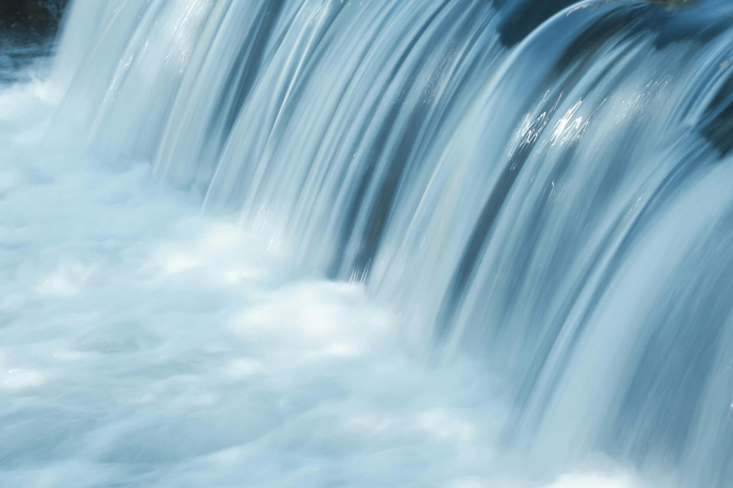 a man riding a surfboard on top of a waterfall, an album cover, pexels contest winner, hurufiyya, blurred detail, blue, water wheel, datastream or river