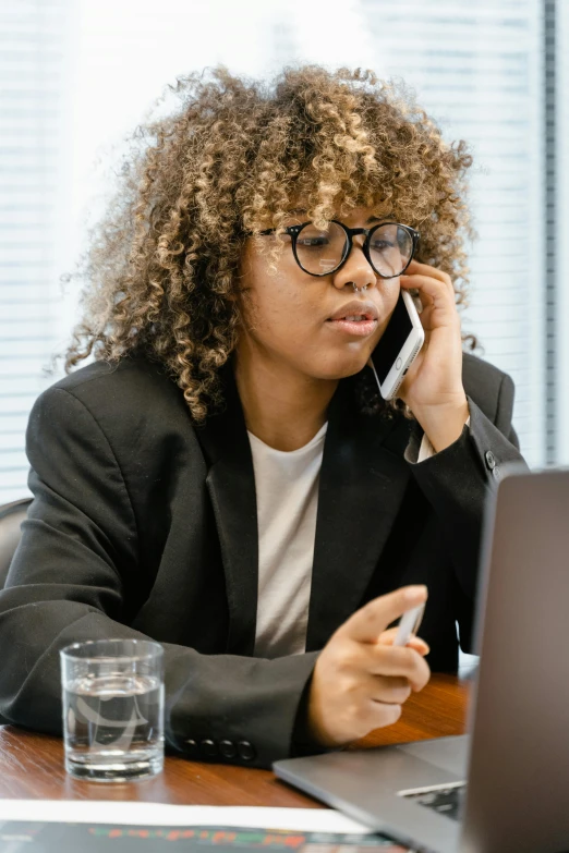 a woman sitting at a desk talking on a cell phone, trending on pexels, renaissance, ashteroth, professional profile picture, struggling, no - text no - logo