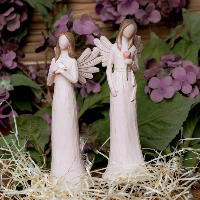 a couple of figurines sitting on top of a pile of hay, by Marie Angel, heaven pink, holding flowers, on wood, different sizes