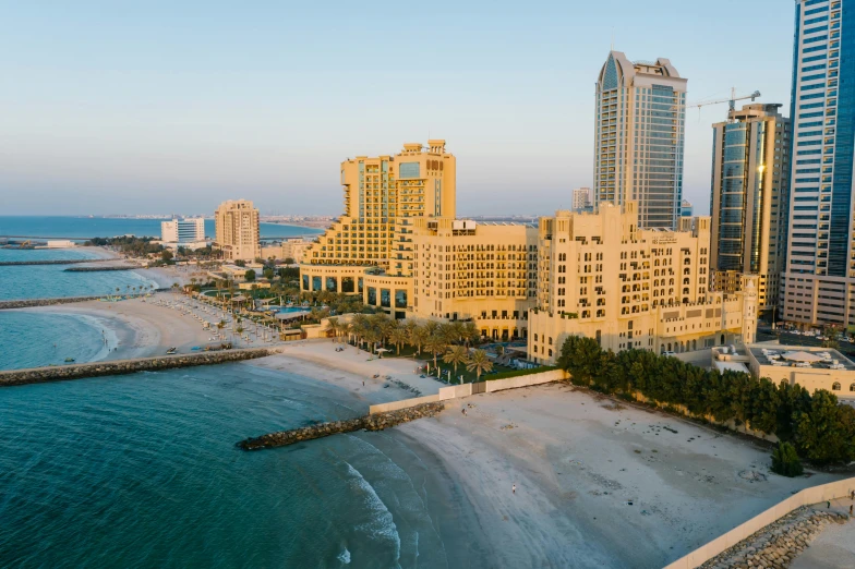 an aerial view of a city on a beach