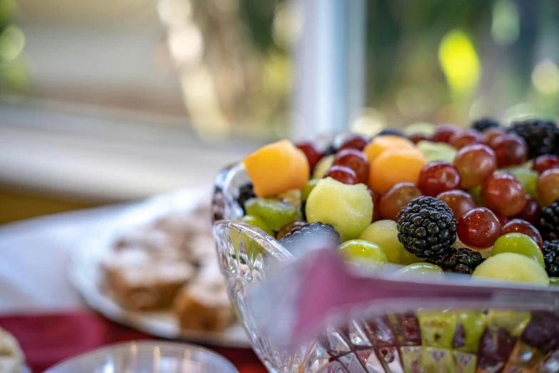 a bowl of fruit sitting on top of a table, by Sebastian Vrancx, pexels, fan favorite, celebration, clear focused details, profile image