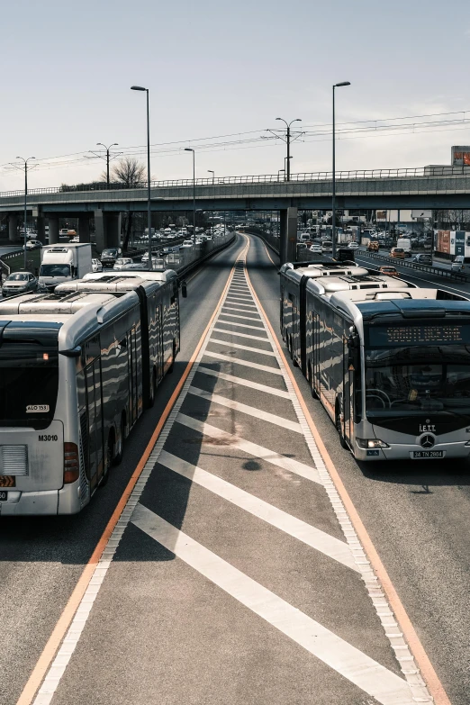 a couple of buses that are sitting in the street, by Niko Henrichon, highways, 🚿🗝📝