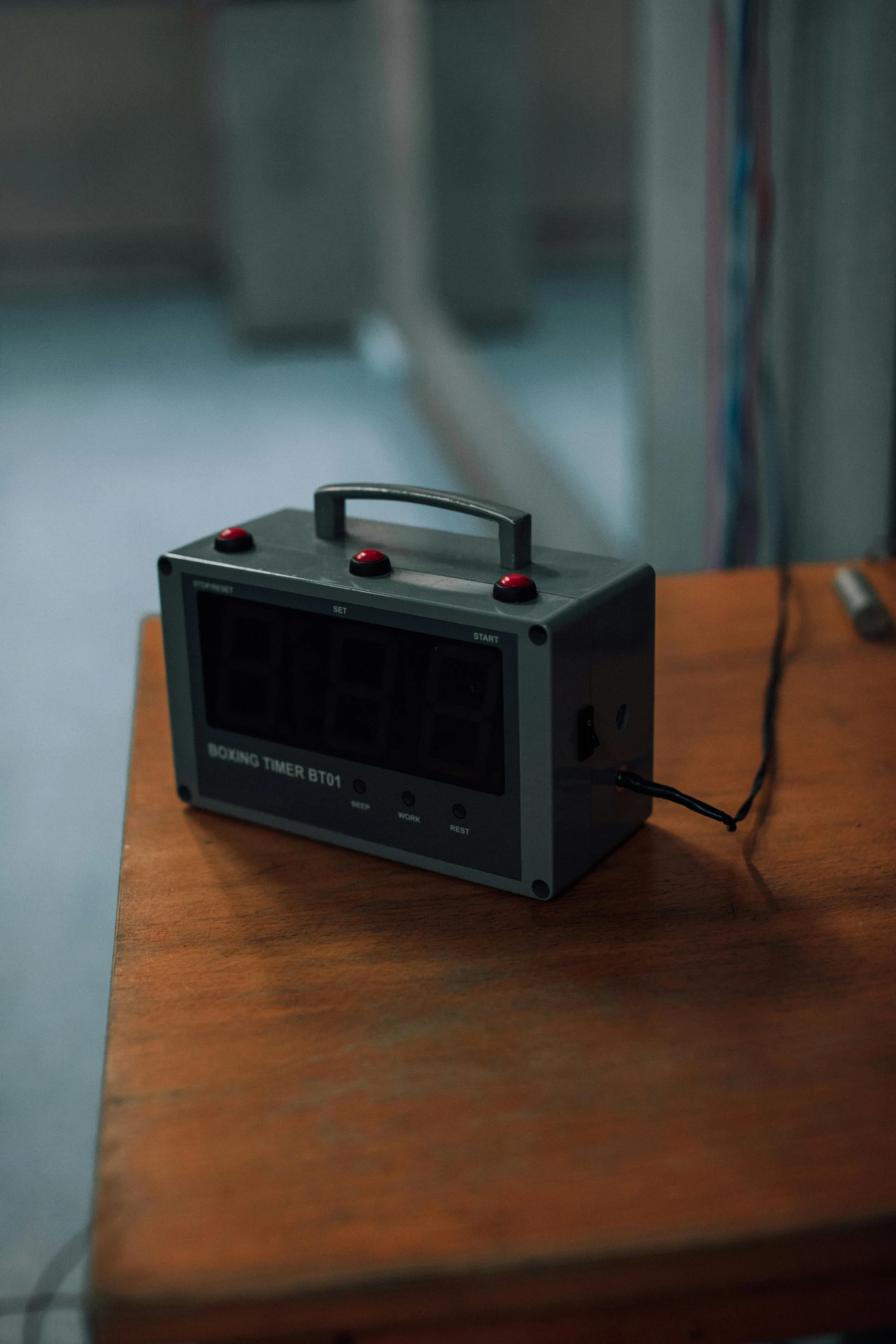 a radio sitting on top of a wooden table