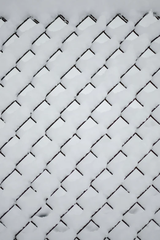 a chain link fence covered in snow, a microscopic photo, inspired by Pierre Pellegrini, unsplash, square, trending on textures. com, roofing tiles texture, isometric