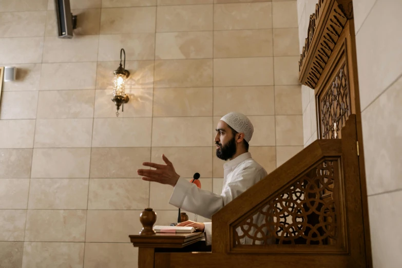 a man standing up at the top of a staircase