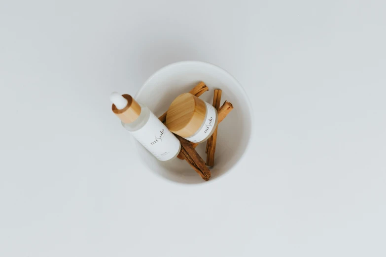 two wooden shaving tools in a bowl