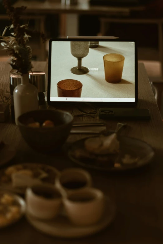 a wooden table topped with cookies and pastry