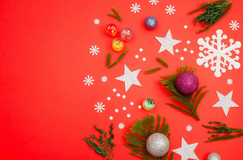 the holiday decorations is arranged on red paper