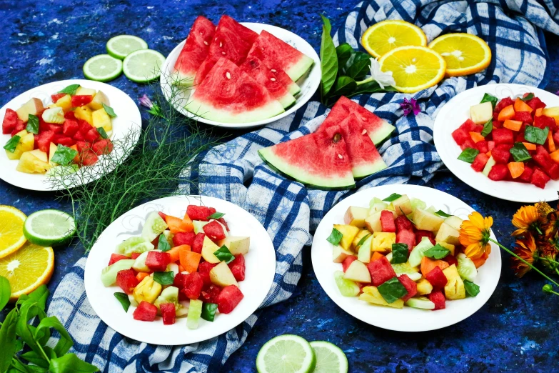 a table topped with white plates filled with fruit, by Julia Pishtar, watermelon, listing image, salad, maxim sukharev