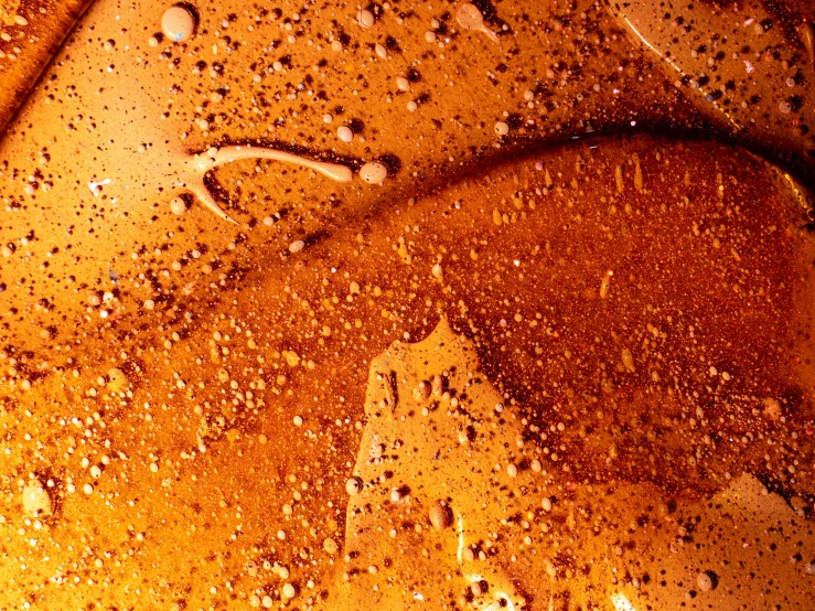 a pancake sitting on top of a pan covered in syrup, a macro photograph, by Thomas Häfner, renaissance, orange color, lots of bubbles, soda, lacquer on canvas