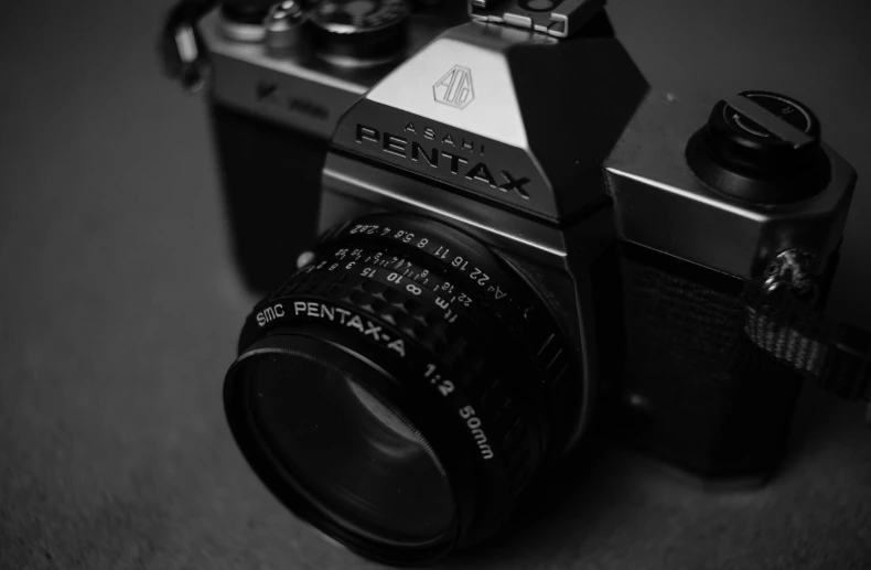 a black and white photo of a camera, by Adam Rex, pexels contest winner, photorealism, pentax 67, shot with a arriflex 35 ii, macro up view metallic, medium format