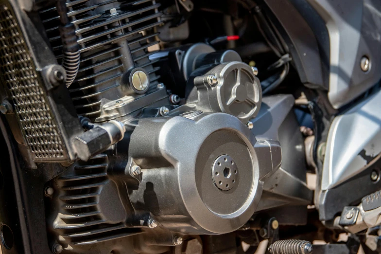 a close up of the engine of a motorcycle, a picture, shutterstock, fan favorite, detailed product image, gray, real engine 5