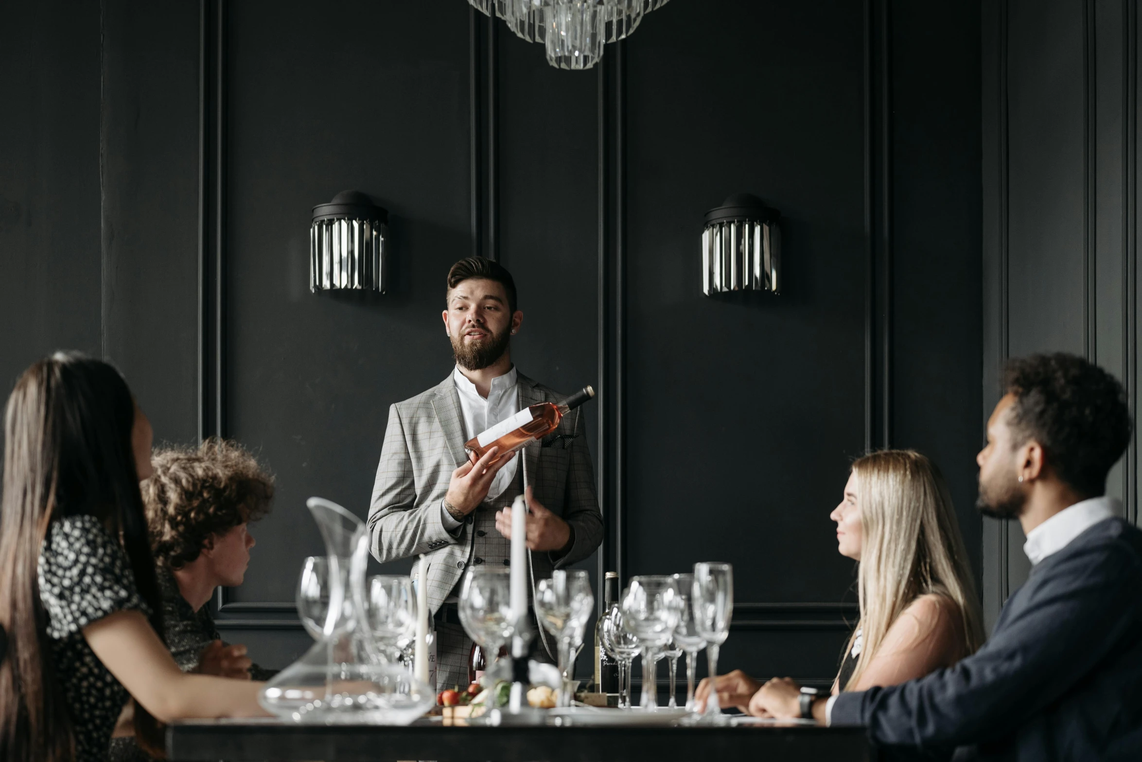 a man at a restaurant giving a speech