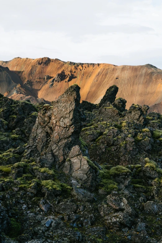 the view of a large mountain in the daytime