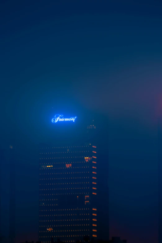 a very tall building with a neon sign on top of it, by Jacob Toorenvliet, flickr, hazy morning foggy, neon!!!!!! atmosphere, blue smoke, ap news photo