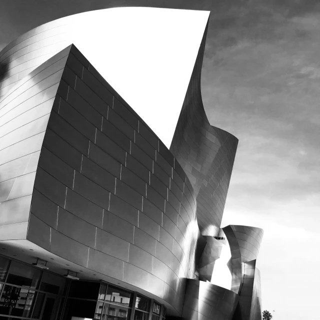 a black and white photo of a building, by Josh Bayer, unsplash contest winner, modernism, frank gehry, disney studios, los angeles 2 0 1 5, concert