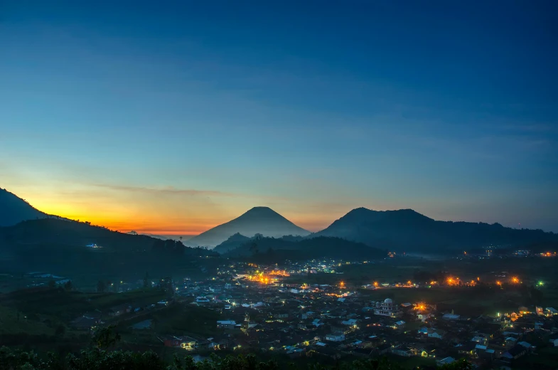 a landscape s of a city at sunset