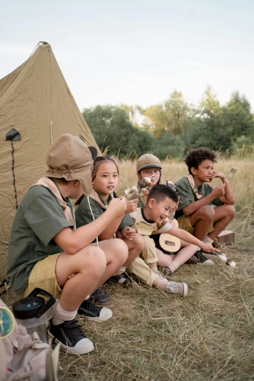 a group of children sitting in front of a tent, trending on unsplash, conceptual art, scout boy, manuka, brown, tan