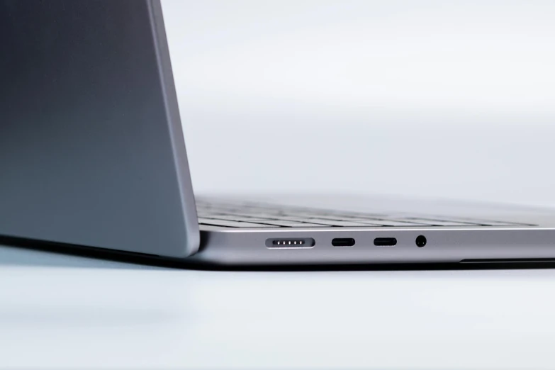 a close up of a laptop computer on a table, by Carey Morris, hyperreal highly detailed 8 k, bottom angle, rounded lines, shot on sony a 7