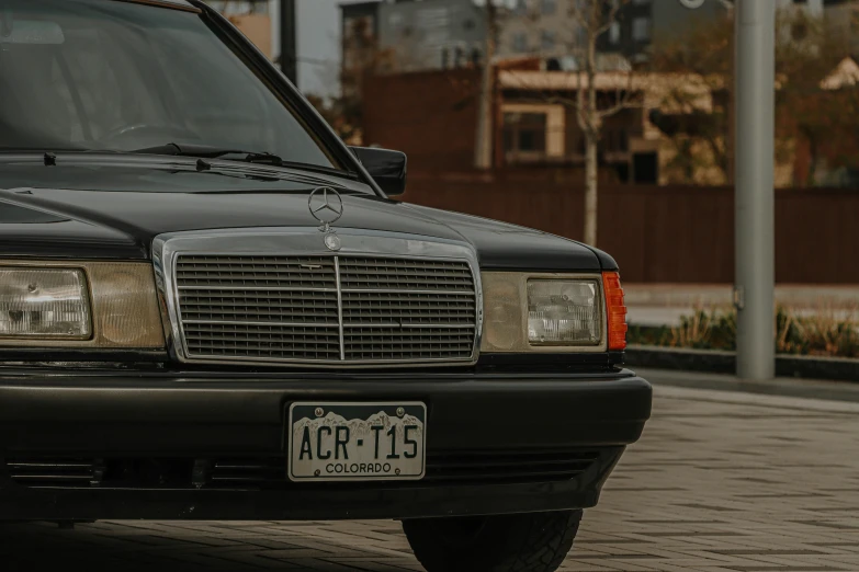 a black mercedes benz benz benz benz benz benz benz benz benz benz benz benz benz benz benz, by Adam Rex, pexels contest winner, colombian, 90s photo, 🚿🗝📝