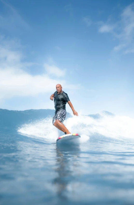 a man on a surf board in the water