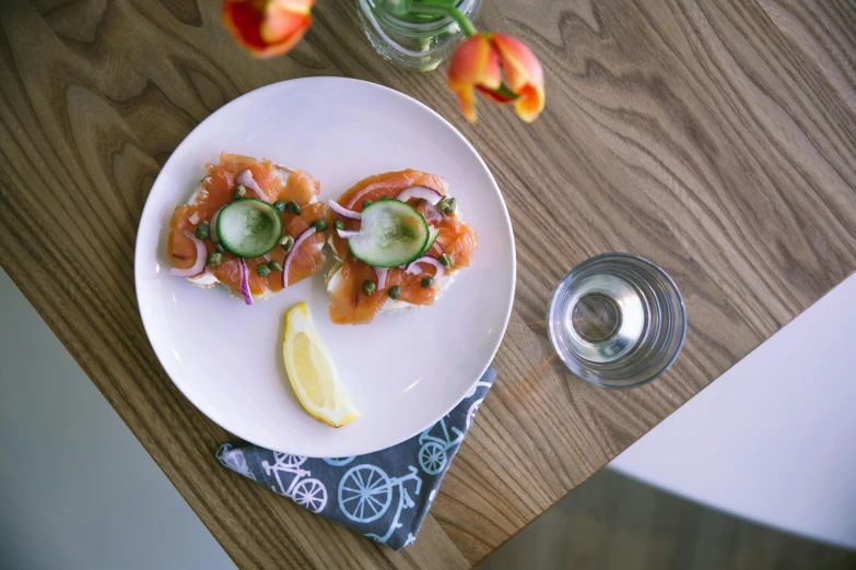 a close up of a plate of food on a table, annato finnstark, salmon, lifestyle, mezzanine