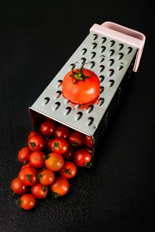 a bunch of tomatoes sitting on top of a grater, an album cover, by Ben Zoeller, shutterstock contest winner, paul barson, made of food, 3 4 5 3 1, trending photo