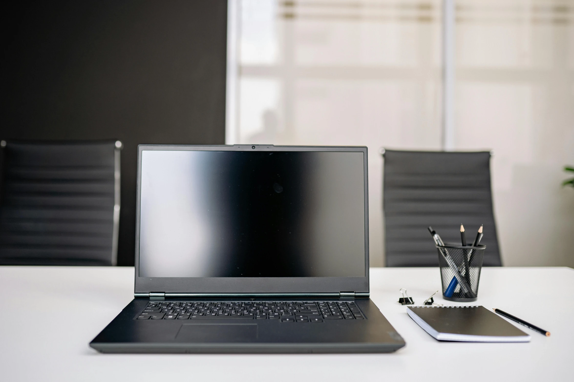 a laptop computer sitting on top of a white table, a computer rendering, unsplash, panel of black, high quality photo, background image