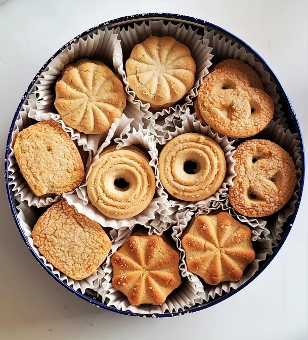 a plate full of chinese pastries with frosting