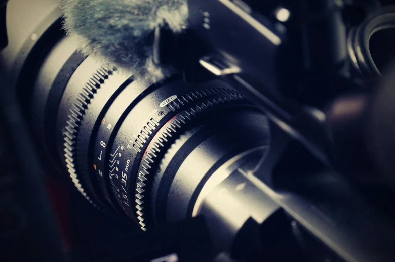 a close up of a camera with a bird on the lens, pexels contest winner, cinema 4d cinematic, blur cinematic, panavision panaflex, intricate gears and lenses