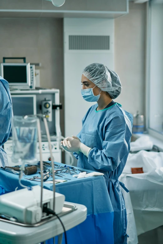 two surgeons working on a patient in an operating room, a picture, shutterstock, happening, surgical supplies, wide - shot, thumbnail, multiple stories