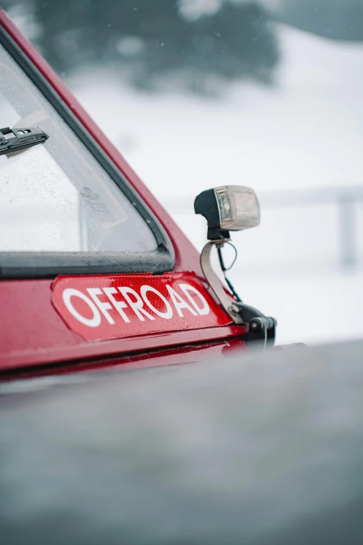 a close up of a red car with the word otroad painted on it