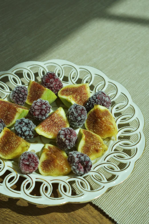 a plate of figs and raspberries on a table, hurufiyya, heat shimmering, high quality product image”, kaleidoscopic, vanilla