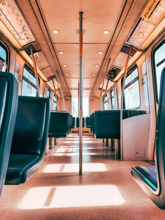 a view of the inside of a train car, by Carey Morris, trending on unsplash, bright sunny day, 🚿🗝📝, orange line, thumbnail