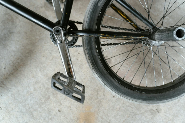 a close up of the front wheel of a bicycle, landing gear, wrench, from yowamushi pedal, rectangle