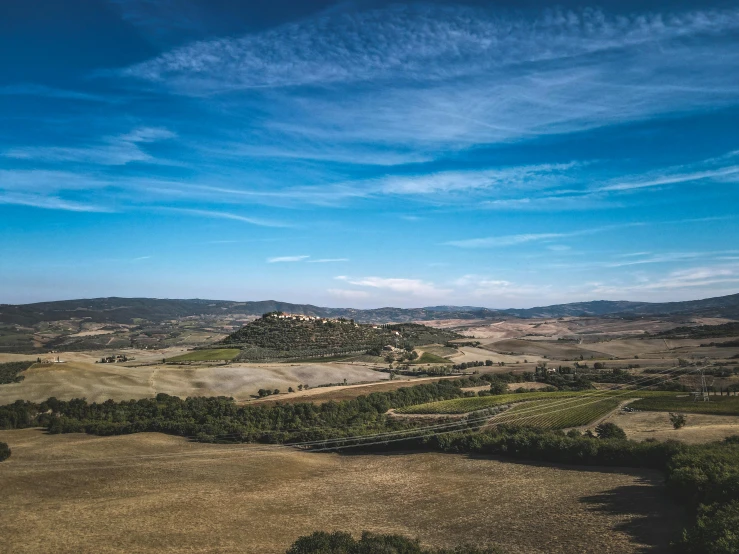 a view of the countryside from the top of a hill, pexels contest winner, renaissance, wine, blue sky, sienna, super high resolution