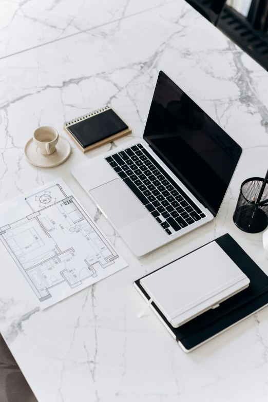 a laptop computer sitting on top of a white table, trending on pexels, modernism, architectural plan, ivory and black marble, knolling, detailed product image