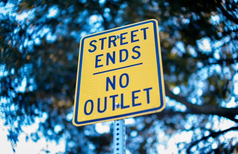 a street ends sign posted outside on a pole