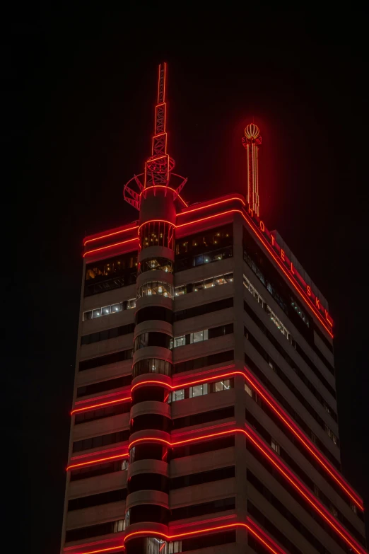 a tower is illuminated with brightly colored lights