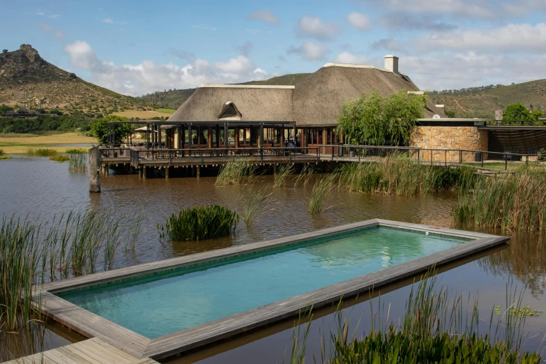 large pool sitting in the middle of a large body of water