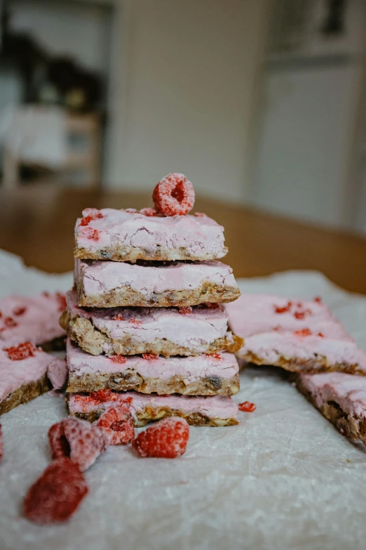 a stack of ice cream sandwiches sitting on top of a table, a portrait, inspired by Richmond Barthé, pexels, happening, raspberries, soft light 4 k in pink, bark, thumbnail