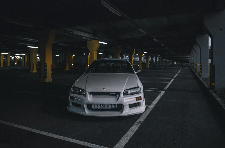 an image of a car that is parked in the dark