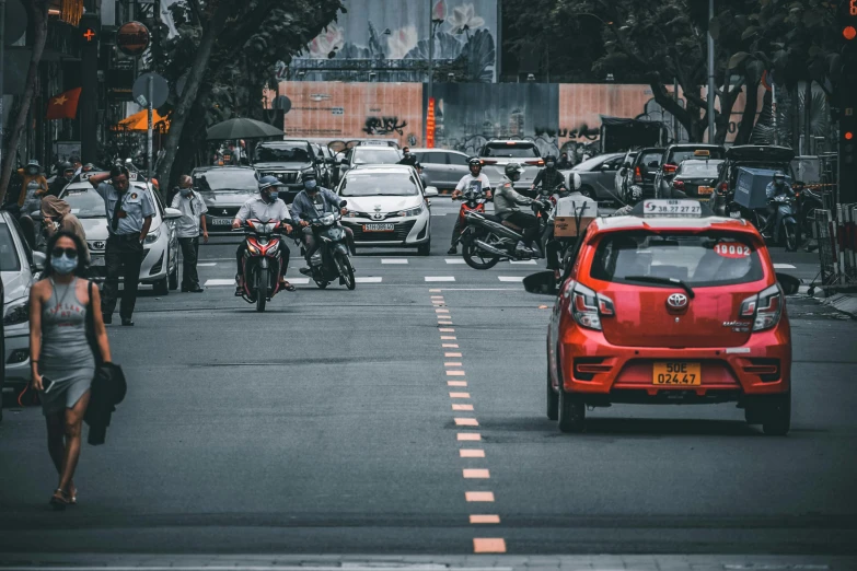 traffic is backed up and parked on the side of a city street