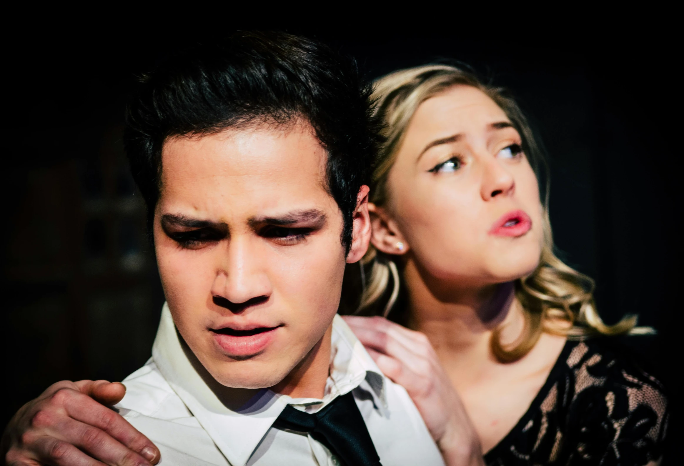 a man standing next to a woman in a dress shirt and tie, by Robbie Trevino, musical, bite her lip, charli bowater and artgeem, over his shoulder