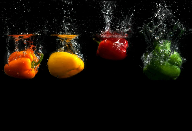 a group of fruits that are in the water, in front of a black background, veggies, thumbnail