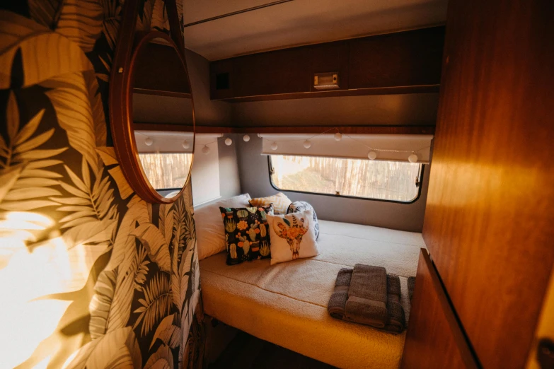 an interior view of a houseboat with sun shining through the windows