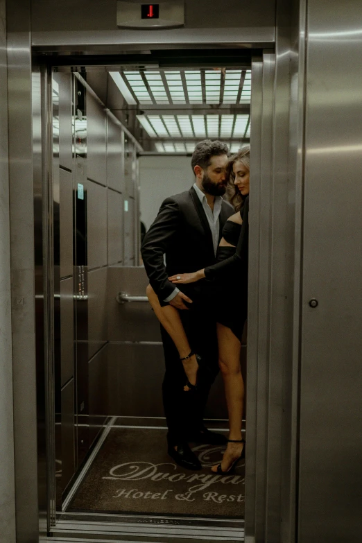 a man and a woman standing in an elevator, pexels contest winner, renaissance, intimate holding close, gif, sexy :8, best photo