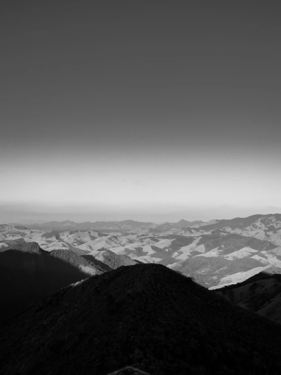 a distant black and white view of mountains