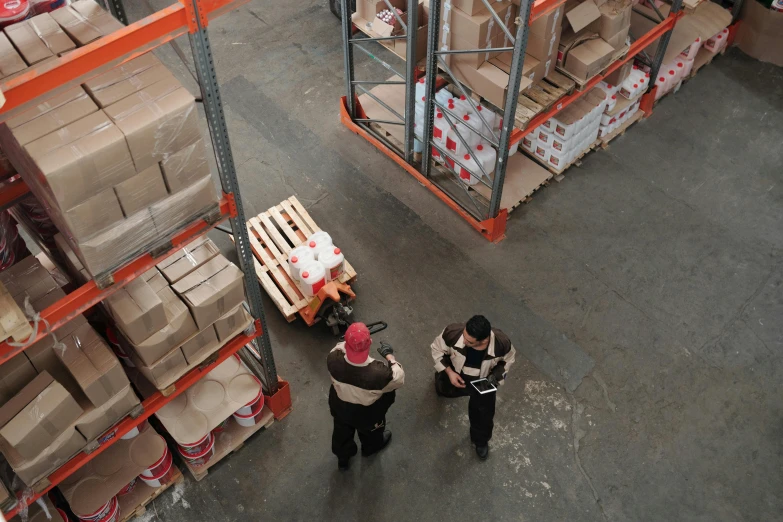a couple of men standing next to each other in a warehouse, pexels contest winner, renaissance, ariel view, thumbnail, full pallet image, multiple stories